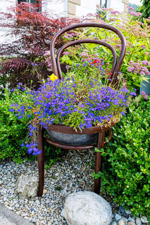 Garden decoration with flowers, Lubietova, Slovak republic. Springtime scene.の写真素材