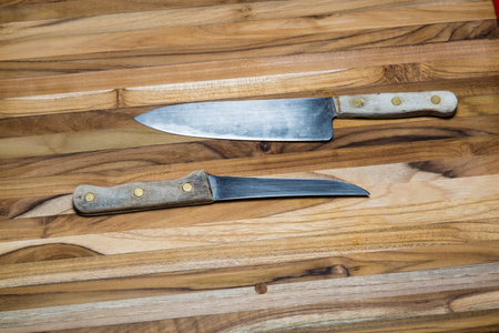 Old Knives on a Teak Cutting Board