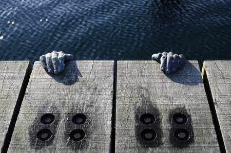 Statue of hands, fingers, Denmark Helsingorの写真素材