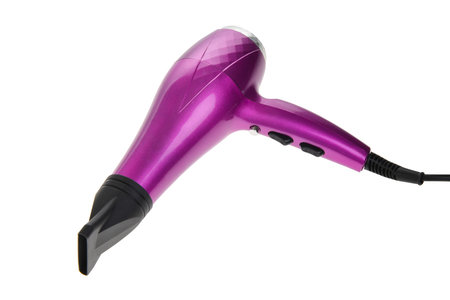 Purple hair dryer isolated on white background with clipping path.の写真素材