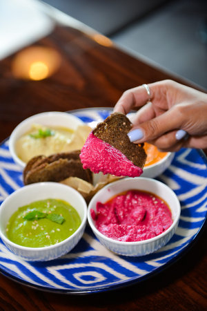 Classic eastern snacks. Hummus set in small bowl