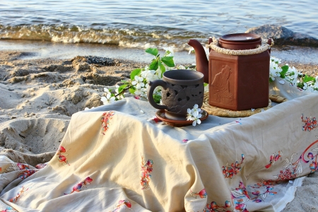 Morning tea ceremony on the beach の写真素材