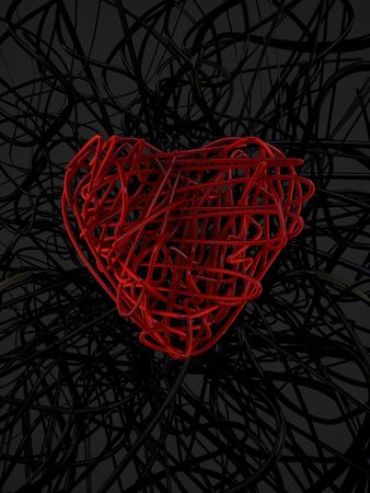 red wire heart and black wire background の写真素材