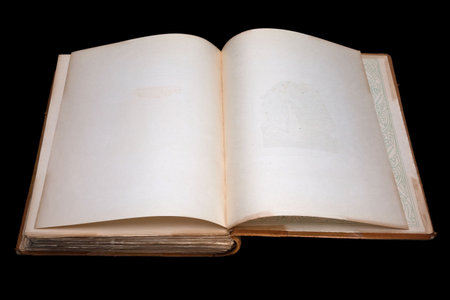 An old book isolated, showing an empty page.