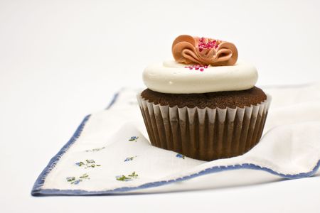 Red Velvet Cupcake decorated with white and pink frosting.の写真素材
