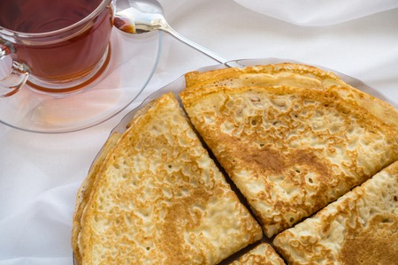 Russia, Severodvinsk, a stack of homemade Russian pancakes in the form of a triangular envelope, flat layの写真素材