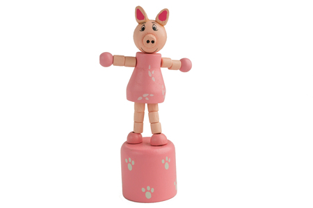 Wooden toy pink pig. Symbol of the year 2019. Isolateの写真素材