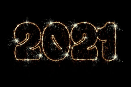 Happy New Year 2021 concept. Sparkling burning numbers Year 2021 isolated on black background....