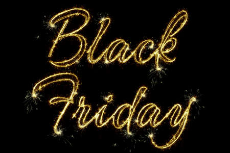 Sparkling burning text Black Friday isolated on black background. Beautiful overlay template object for design holiday greeting card, billboard and web banner.の写真素材