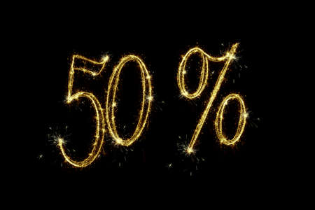 Sparkling burning text 50 percent isolated on black background. Beautiful overlay template object for design holiday greeting card, billboard and web banner.の写真素材