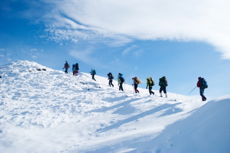 hiker in a winter mountainの写真素材