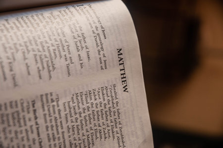Close up of an open bible book in a church. Selective focus.
