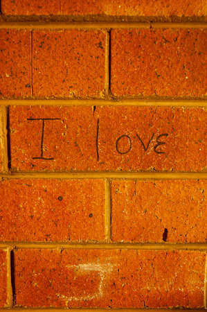 \\"\"I love you\"\" written on a brick wall\""の写真素材