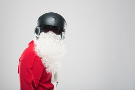 Santa Claus on a gray background with giftsの写真素材