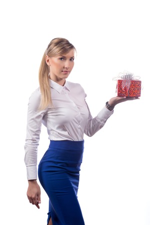 Smiling business woman  holding gift box. white shirt. Isolated.の写真素材