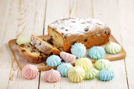 Delicious homemade cake with raisins on a light wooden background. close-up. rustic. copy space.の写真素材