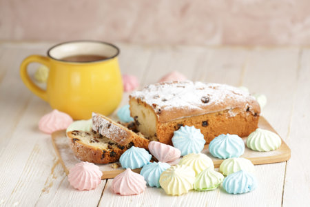 Delicious homemade cake with raisins on a light wooden background. close-up. rustic. copy space.