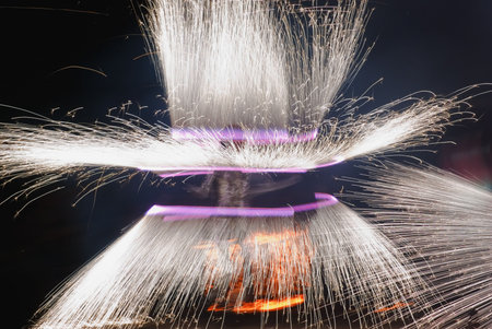 Many golden fireworks bursts at fireworks festival