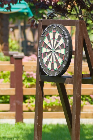 dart board standing in a city parkの写真素材