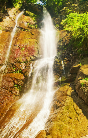 Waterfall Mahuntseti in the mountains of Georgiaの写真素材