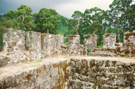 ruins of an old fortress wall in the forestのeditorial素材