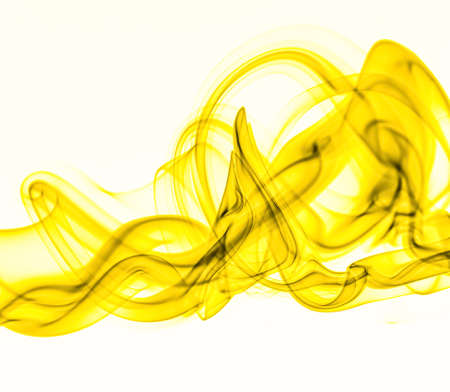 Abstract swirling movement of yellow smoke moving on white background. Steam fire designの写真素材