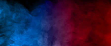 Close-up of colorful smoke with spray from a humidifier. Isolated on black backgroundの写真素材