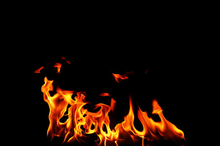 a pile of abstract heat energy flames Burning fuel at night. isolated on a black background.
