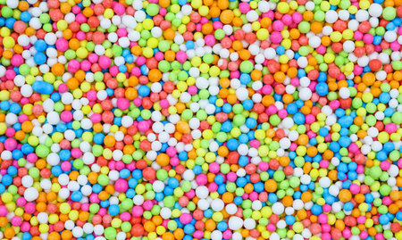 top view close-up texture Sugar candy is a small circle rainbow colorful, sweet food, for sprinkles,...
