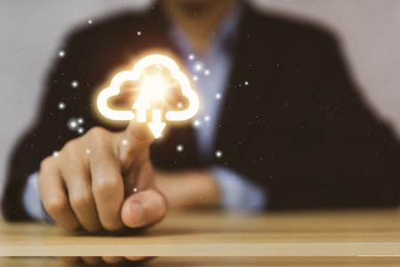 Businessman's hands showing a diagram of Cloud computing information technology icon. Concept of big...