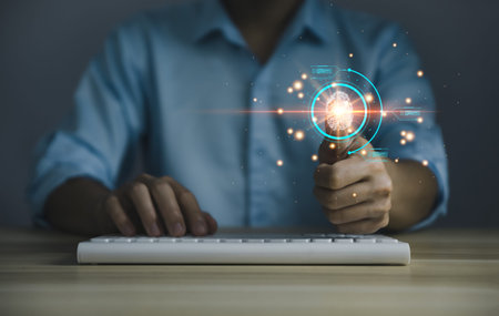 Businessman scans fingerprints for identity verification Biometrics. cybersecurity concept, computer...