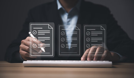 Businessman signing electronic contract on virtual laptop screen via the internet Information concept of the digital technology document business, smart contract, corporate paperless office.の写真素材