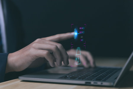 Businessman scans fingerprints for identity verification Biometrics. cybersecurity concept, computer...