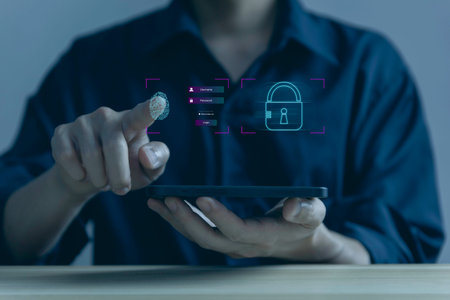 Businessman scans fingerprints for identity verification Biometrics. cybersecurity concept,...