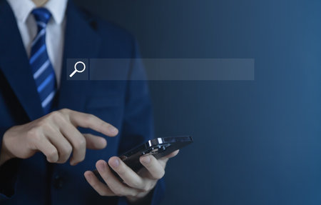 Businessman showing internet search. Entering digital technology through browsers and communication tools connection and website Concepts of using networks for business efficiencyの写真素材