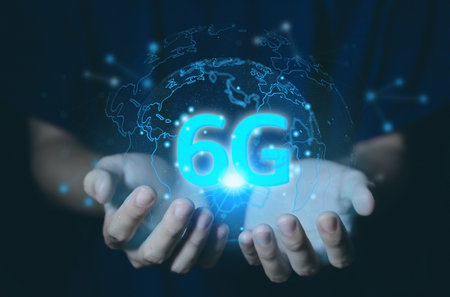 hand show hologram 6G digital technology, access to information around the world. 6G wireless internet network concept or IOT, high-speed communication connection.の写真素材