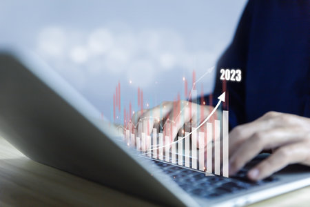 Businessman planning digital stock market analysis strategy showing positive technology chart powerful investment ideas exchange rate economy development stock growth and business success goalsの写真素材