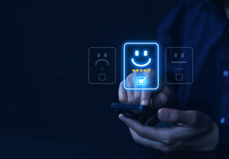 positive customer reviews touch the happiness icon and a five-star smiley face. Satisfaction survey concept, opinions, customer service The best response from the user experience of the prodの写真素材
