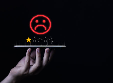 Customer Review Experience Dissatisfied Selection of 1-star rating reviews on smartphone screens. negative feedback concept Unhappy businessman, poor service, or poor quality.の写真素材