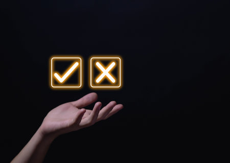Businessman hand showing right and wrong symbol The idea is to decide to vote. Think yes or no decisions, and business options for difficult situations. true and false symbols agreeingの写真素材
