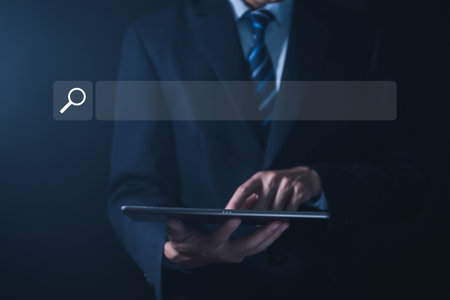 Businessman showing internet search. Entering digital technology through browsers and communication tools connection and website Concepts of using networks for business efficiencyの写真素材