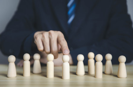 Manager CEO, Successful Market Leader Businessman, Human Resource Management or Staff Recruitment Concept of leading business leaders and executives. wood block peopleの写真素材