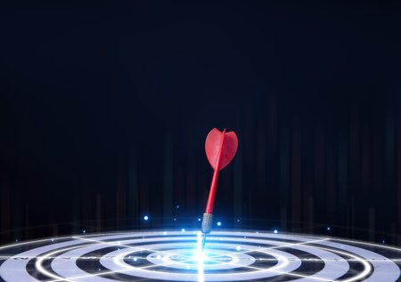red dart aiming precisely at the center of the digital technology target board. business investment objective concept Marketing strategies and goals for successの写真素材