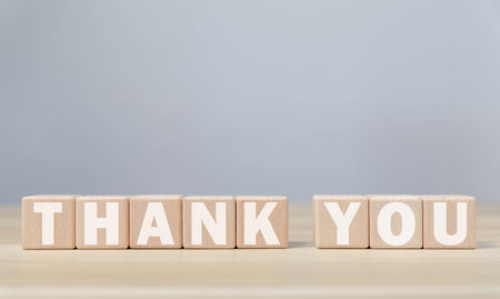Wooden block showing a message, the word thank you. Letter writing concept. Congratulations, Appreciation, with Copy Spaceの写真素材