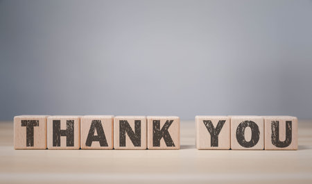 Wooden block showing a message, the word thank you. Letter writing concept. Congratulations, Appreciation, with Copy Spaceの写真素材