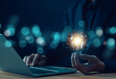 businessman hold lightbulb technology digital energy electricity. concept of the idea of creative...