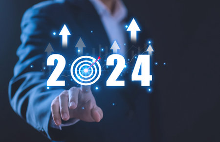businessman show Implementation of the 2024 goal plan, business planning ideas, and strategies....