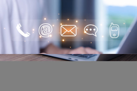 businessman using a laptop to contact customer support shows a contact icon ( address, phone, email, mobile, call ) contact us concept. help from mail websites  digital technology of business serviceの写真素材