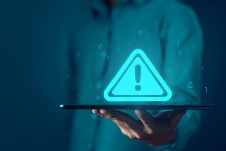 tablet shows a warning sign of system failure. concept notification a spam, risk of website technology digital online. caution danger if a computer is attacked cyber error symbol, leak software dataの写真素材