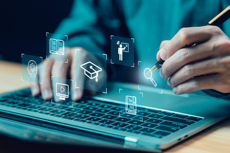 e-learning icon on a virtual screen in a laptop. concept learn, webinar technology, course...